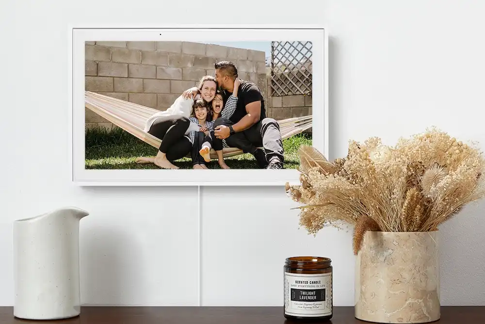 Photo Slideshow feature on Skylight Calendar with an screensaver of a girl holding a puppy